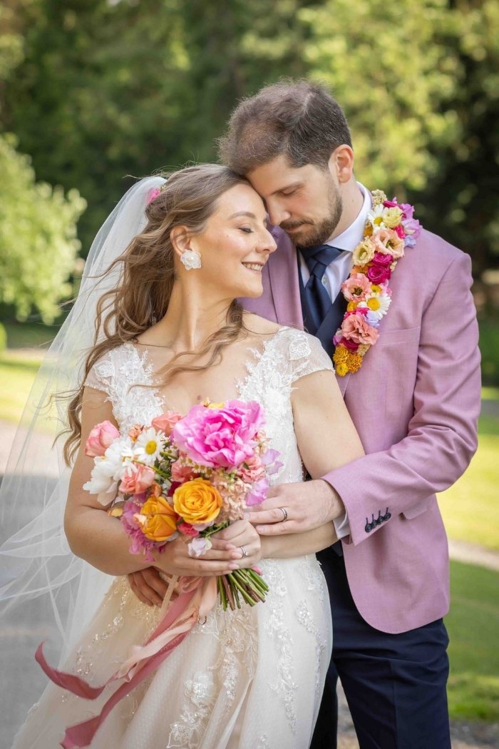 Newlyweds with flowers - Wedding Photography Sligo - Pink Lime Studios