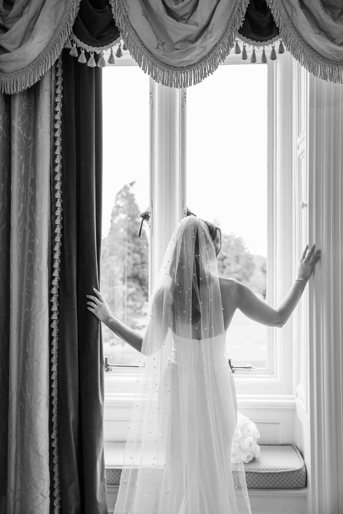 Autumn Wedding Photos - Bride at the window, black & white - Pink Lime Studios, Wedding Photographer Sligo
