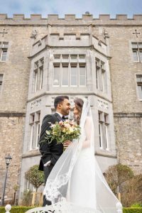 Luxury Castle Wedding - Bride & Groom in castle grounds - Pink Lime Studios Wedding Photography