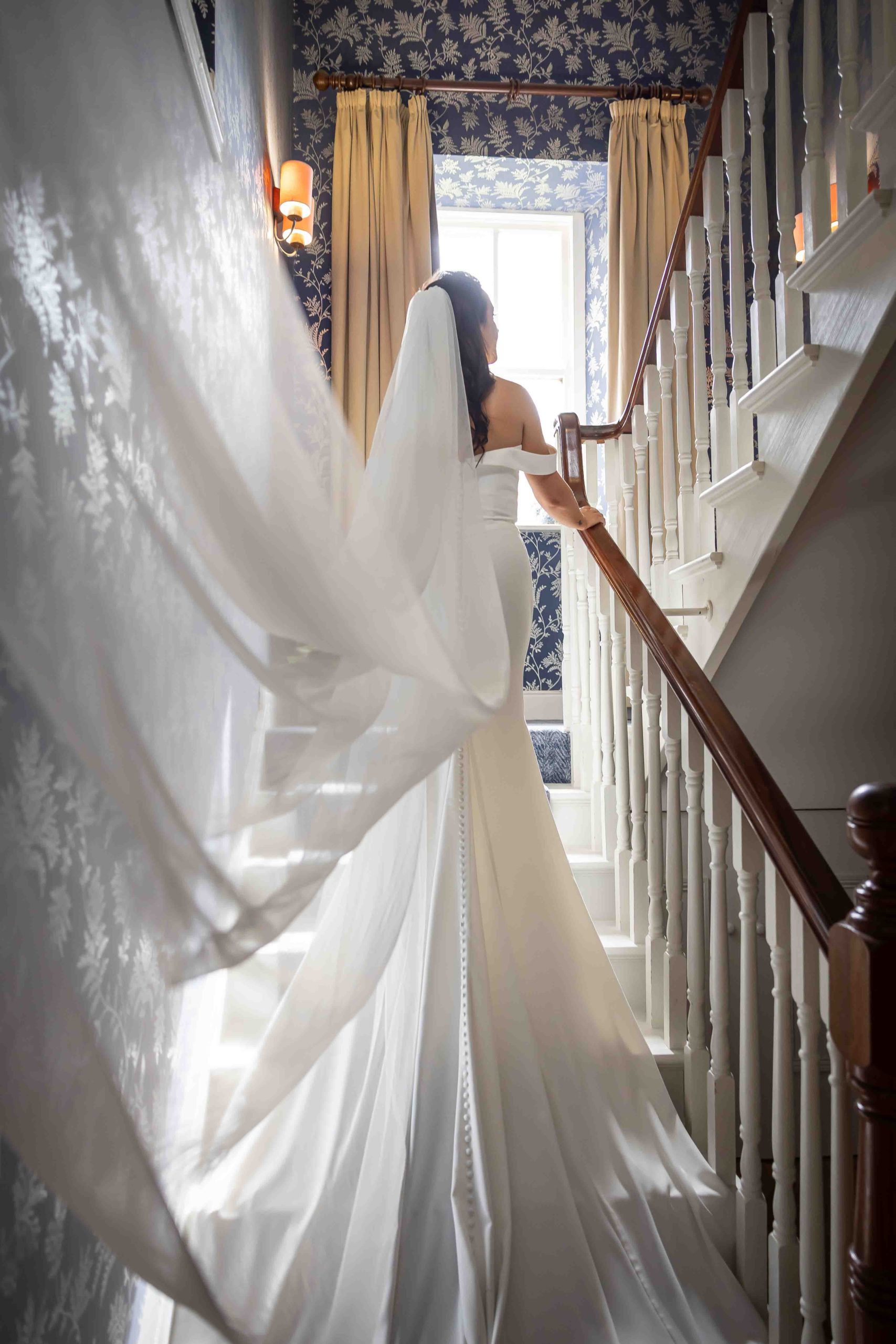 wedding photography bridal portrait on stairs big veil