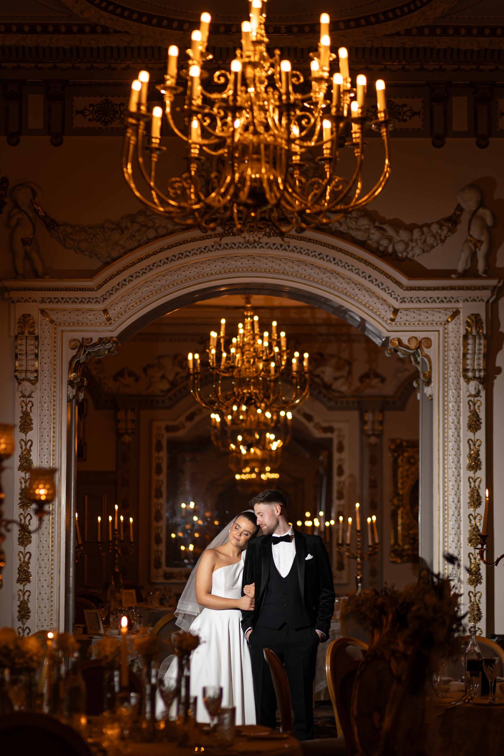 bride and groom stand together in ballroom in markree