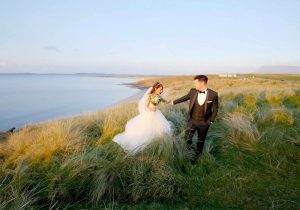 Beach Wedding Photographs - Bride and Groom on sunset Sligo beach - Pink Lime Studios