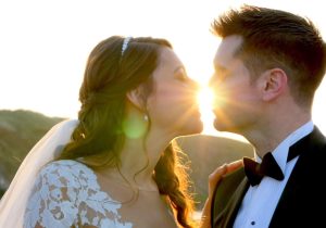 Beach Wedding Photographs - Bride and Groom on sunset beach - Pink Lime Studios