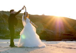 Beach Wedding Photographs - Bride and Groom on the beach - Pink Lime Studios